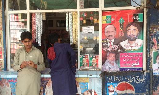Description: A PPP poster supporting Seraikistan is placed outside a shop in Jalalpur. Photo: Dawn.com