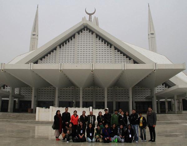 Description: Members of the 2013 2015 Indian delegation at the Faisal Mosque in Islamabad.— The Citizens Archive of Pakistan.