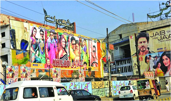 Description: Bollywood movie posters in Lakshmi Chowk Lahore