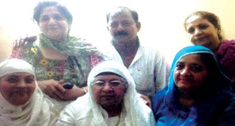 Description: (Front) Jameela, Harbajan/Shahnaz, Zubeida; (back) Khursheed, Rizwaan, Iqbal:Reunited after 50 years; (Below) Dr Ishtiaq Ahmed