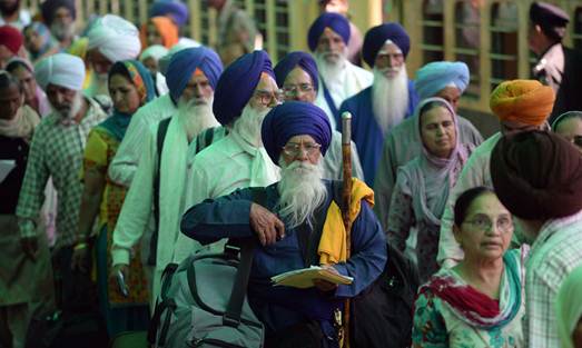 Description: Description: Indian Sikh pilgrims arrive at Wagah Railway Station in Wagah, to celebrate Baisakhi, or the Sikh New Year. – AFP/File