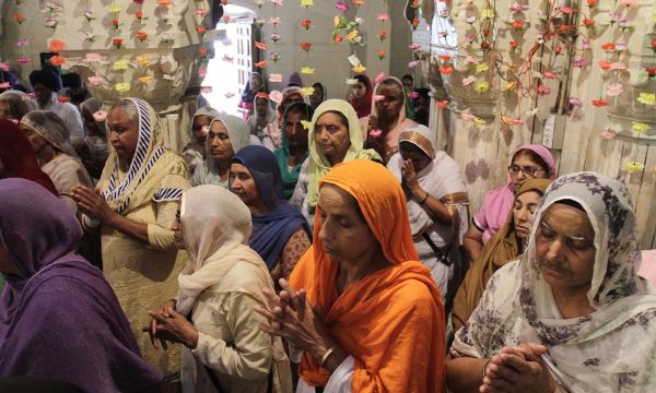Description: Sikh pilgrims attend a congregation of Maharaja Ranjit Singh on his 176th death anniversary in Lahore, Monday, June 29, 2015.-AP
