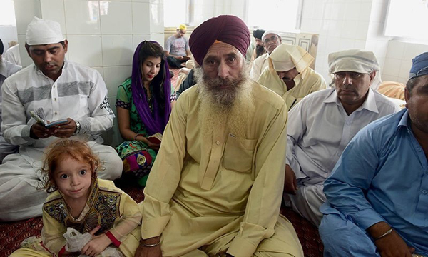 Description: Sikhs say returning home will be their ultimate happiness.—AFP/File