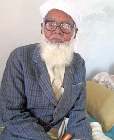Description: Haji Nazar Mohammad, in his late 90s, a resident of Vahali village who spent his childhood with Hindus and Sikhs of the village