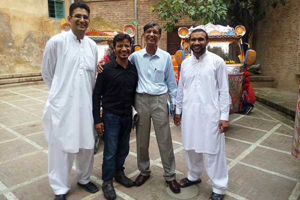 Description: With my young fans in Old Lahore, from Left to Right: Farasat Ali Shah Bukhari, Asim Mirza, self, and Khalid Hussain Majeed.