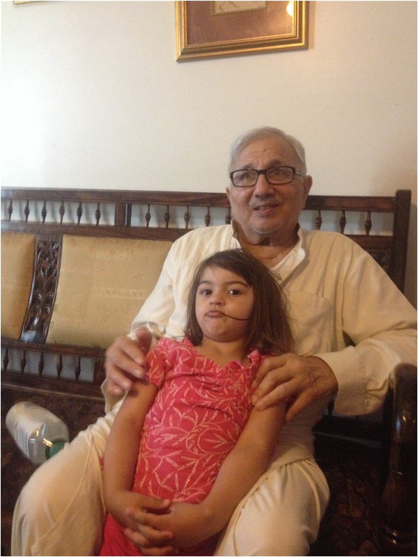 Description: Mohammed Saleem, with his grand-daughter Asiya