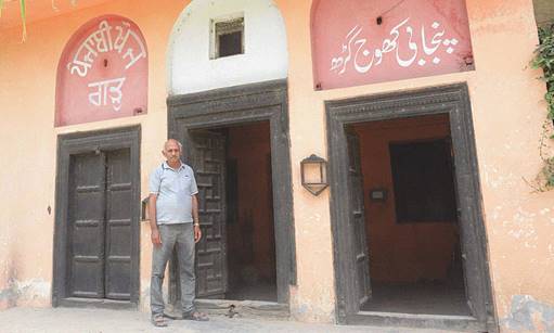 Description: Iqbal Qaiser stands outside Khoj Garh | Azhar Jafri, Wihte Star
