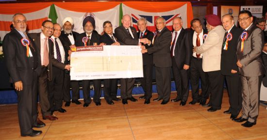 Description: The Executive Committee with cheque