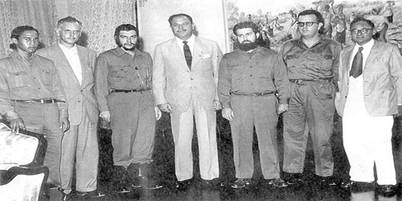 Description:  The Marxist revolutionary, Che Ernesto Guevara, standing along side Pakistan’s first military dictator, Ayub Khan 