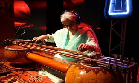 Description: Noor Zehra Kazim, daughter of Raza Kazim, plays the Sagar Veena, which her father created. Photo courtesy: Sanjan Nagar Institute of Philosophy and Arts/Facebook