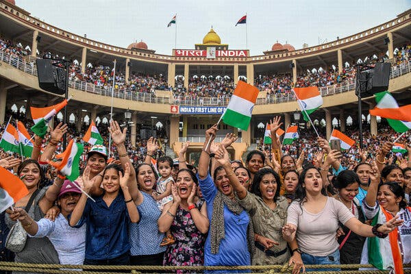 Description: Indian spectators during the daily flag-lowering ceremony at the Attari-Wagah border post in Punjab.