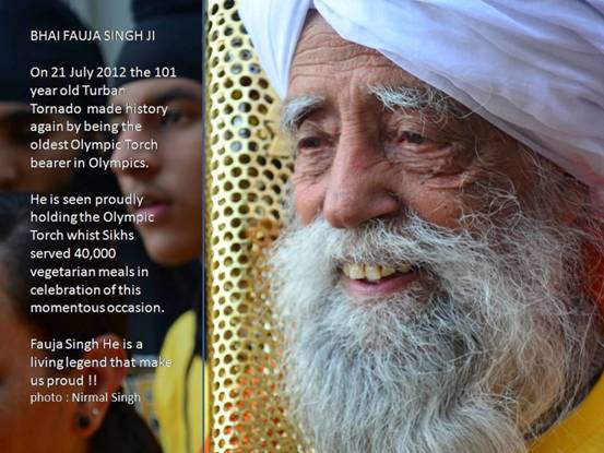 Fauja Singh with Olympic Torch-Jul12.jpg