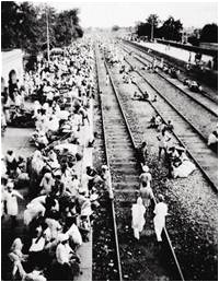 The Amritsar train station crowded with Hindus waiting for a train to take them to India and safety